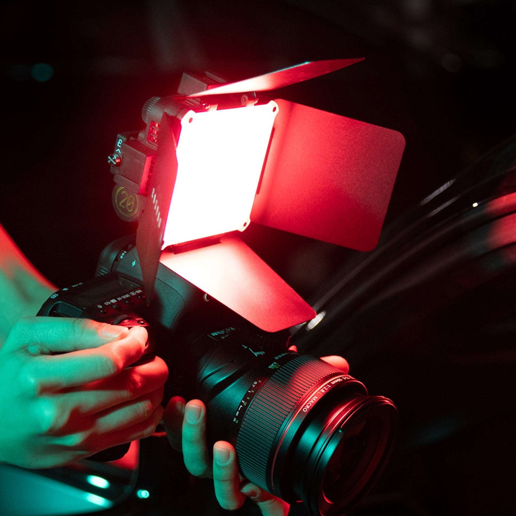 ZHIYUN Black four-leaf-shaped photography light shade, with grid honeycomb, grey zipper bag, white square panel, and photography accessory.