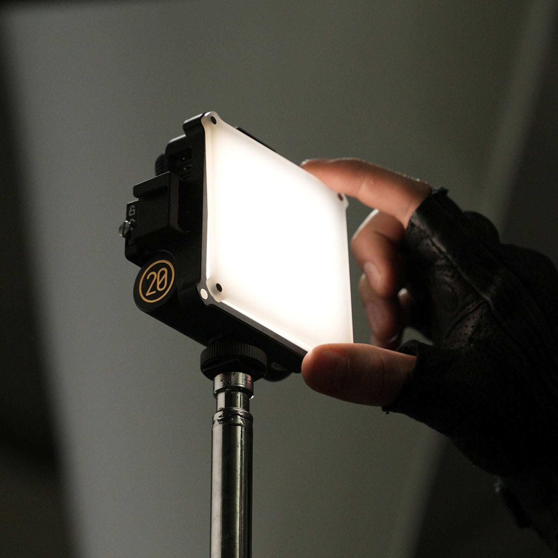 ZHIYUN Black four-leaf-shaped photography light shade, with grid honeycomb, grey zipper bag, white square panel, and photography accessory.