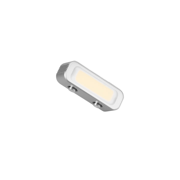 ZHIYUN main body is white, with a yellow rectangular magnetic fill light emitting from the center