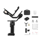 Filmmaker adjusting settings on CRANE 4 camera gimbal stabiliser touchscreen in a studio setup